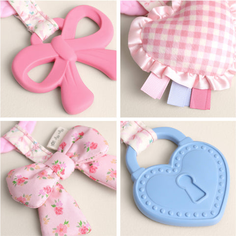 Bitzy Busy Ring™ Teething Activity Toy - Bow Set