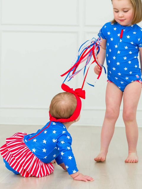 Long Sleeve Skirted One Piece Rash Guard Swimsuit - Shimmer Stars & Stripes