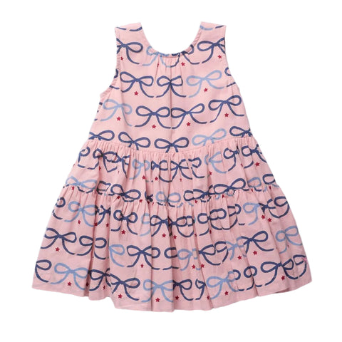 Pink dress with blue bow pattern on a white background